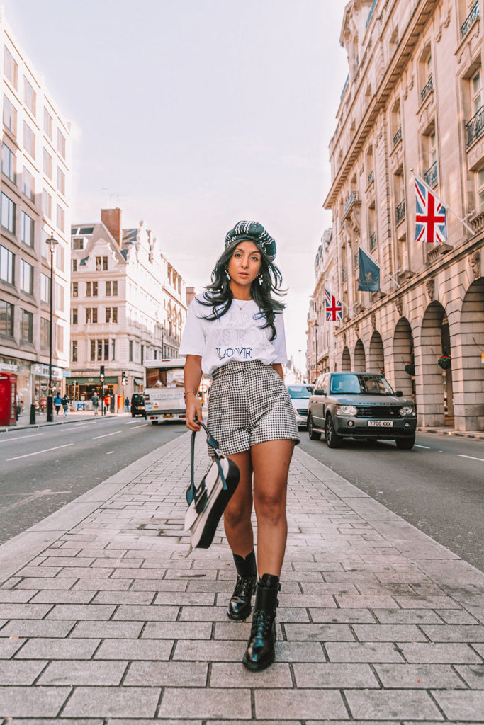 Luxury London fashion blogger Shloka Narang of The Silk Sneaker shares three fall outfit trends to wear before anyone else in biker boots, Sandro and Prada