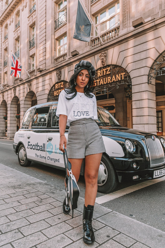 Luxury London fashion blogger Shloka Narang of The Silk Sneaker shares three fall outfit trends to wear before anyone else in biker boots, Sandro and Prada