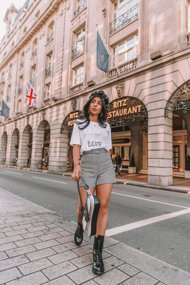 Luxury London fashion blogger Shloka Narang of The Silk Sneaker shares three fall outfit trends to wear before anyone else in biker boots, Sandro and Prada