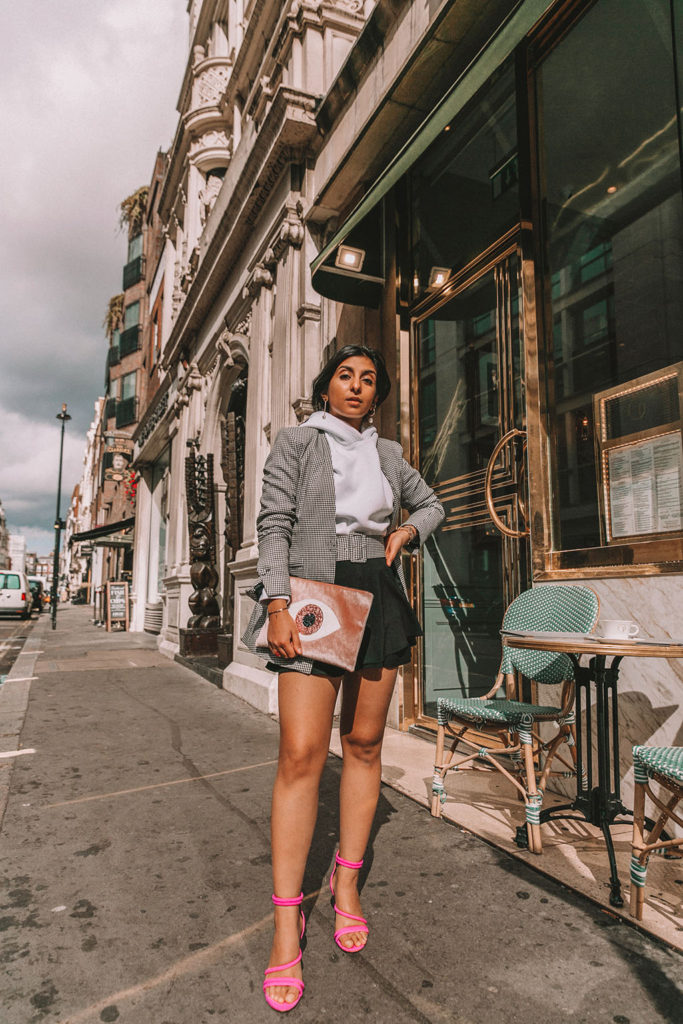 Luxury fashion blogger Shloka Narang of The Silk Sneaker shares three new ways to wear a blazer for the perfect autumn winter outfit featuring a plaid Zara blazer and pink heels