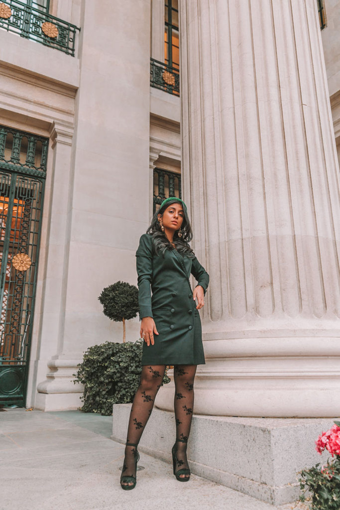 Luxury fashion blogger Shloka Narang of The Silk Sneaker shares how to style a blazer dress and printed tights