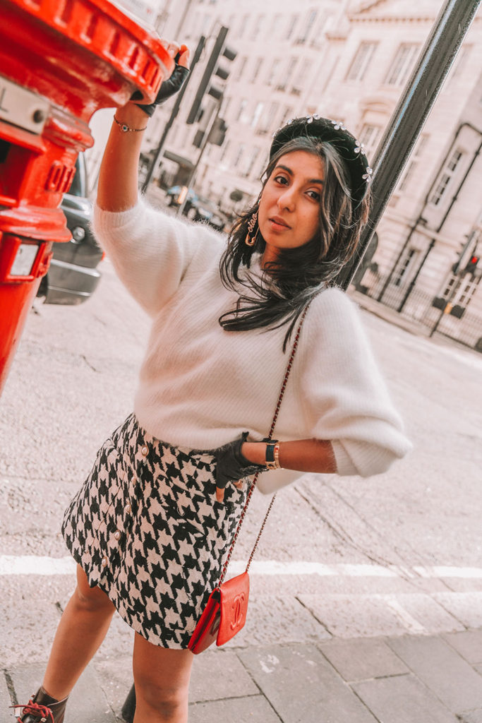 Luxury fashion blogger Shloka Narang of The Silk Sneaker shares five winter outfit styling tricks to create a chic and casual outfit in Dream Sister Jane, Ba&sh and Chanel boots