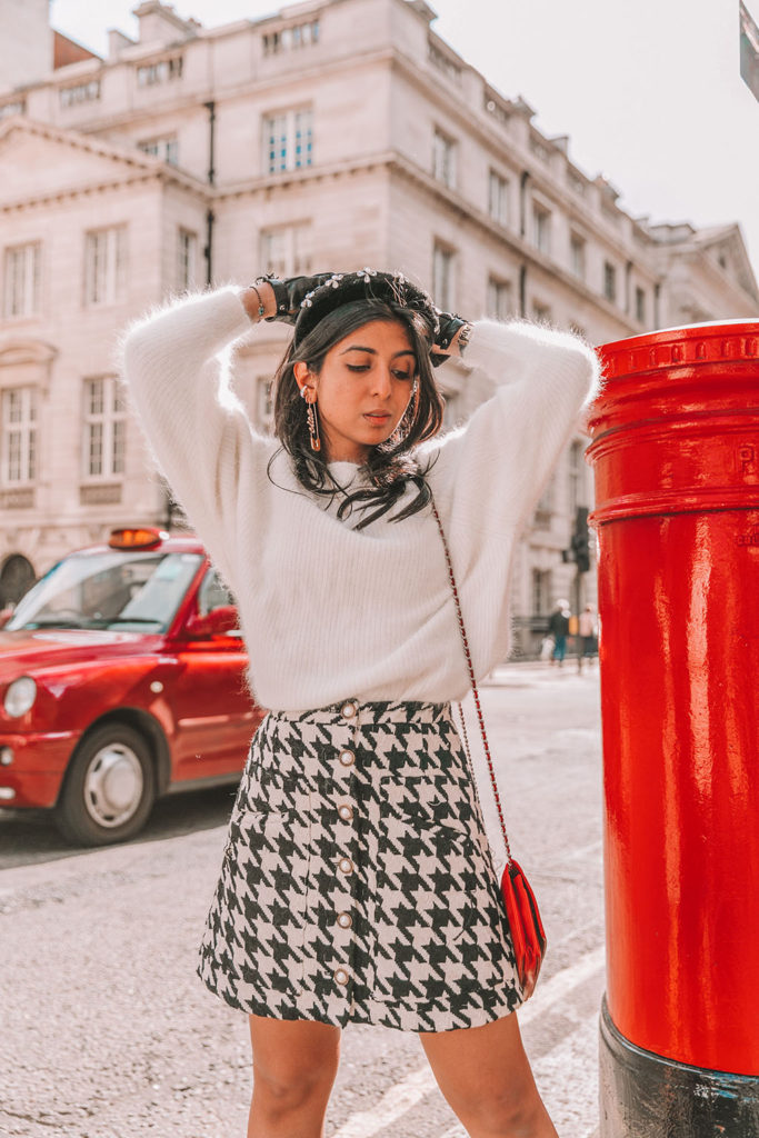 Luxury fashion blogger Shloka Narang of The Silk Sneaker shares five winter outfit styling tricks to create a chic and casual outfit in Dream Sister Jane, Ba&sh and Chanel boots