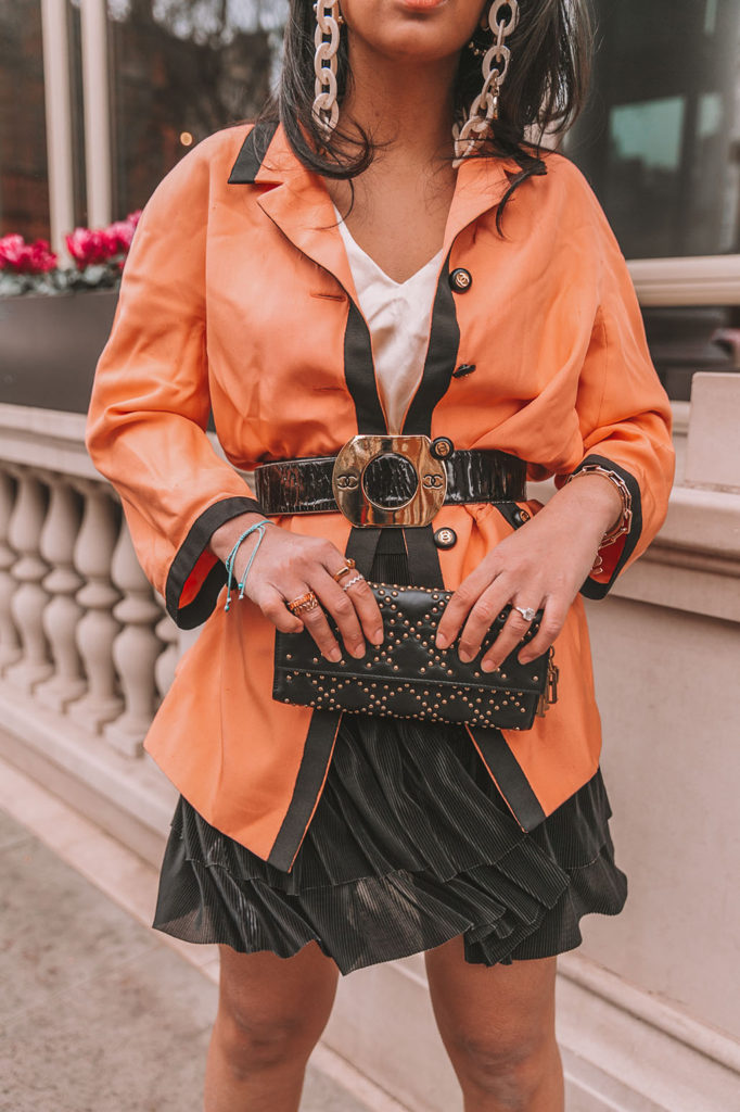 Luxury fashion blogger Shloka Narang of The Silk Sneaker shares her tips for how to tell if beauty products are expired while wearing a vintage Chanel outfit