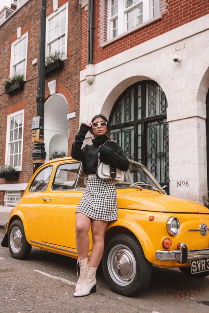 Fashion blogger Shloka of The Silk Sneaker shares her style icon Audrey Hepburn with Farfetch wearing Miu Miu and Prada