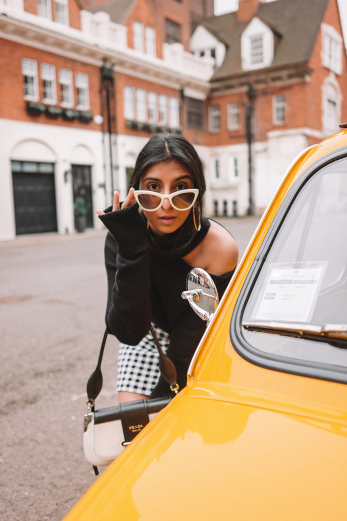 Fashion blogger Shloka of The Silk Sneaker shares her style icon Audrey Hepburn with Farfetch wearing Miu Miu and Prada