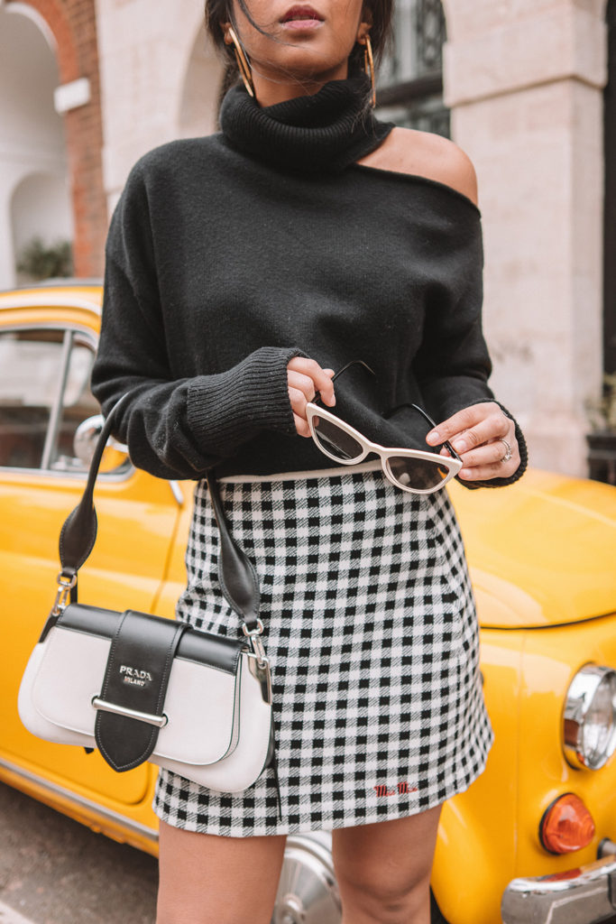 Fashion blogger Shloka of The Silk Sneaker shares her style icon Audrey Hepburn with Farfetch wearing Miu Miu and Prada
