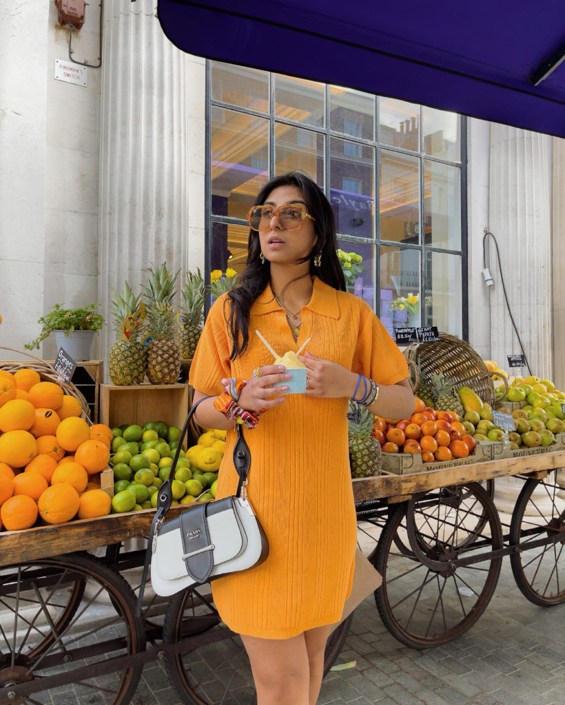 Luxury Fashion Blogger Shloka of The Silk Sneaker styles a Prada Sidonie Bag