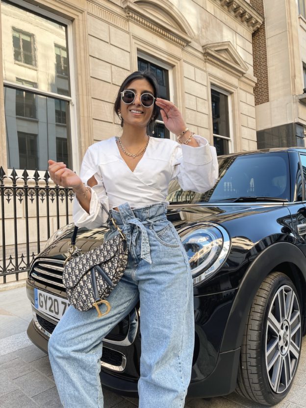 Luxury Fashion Blogger Shloka of The Silk Sneaker shares how to look chic in a travel outfit for 2021