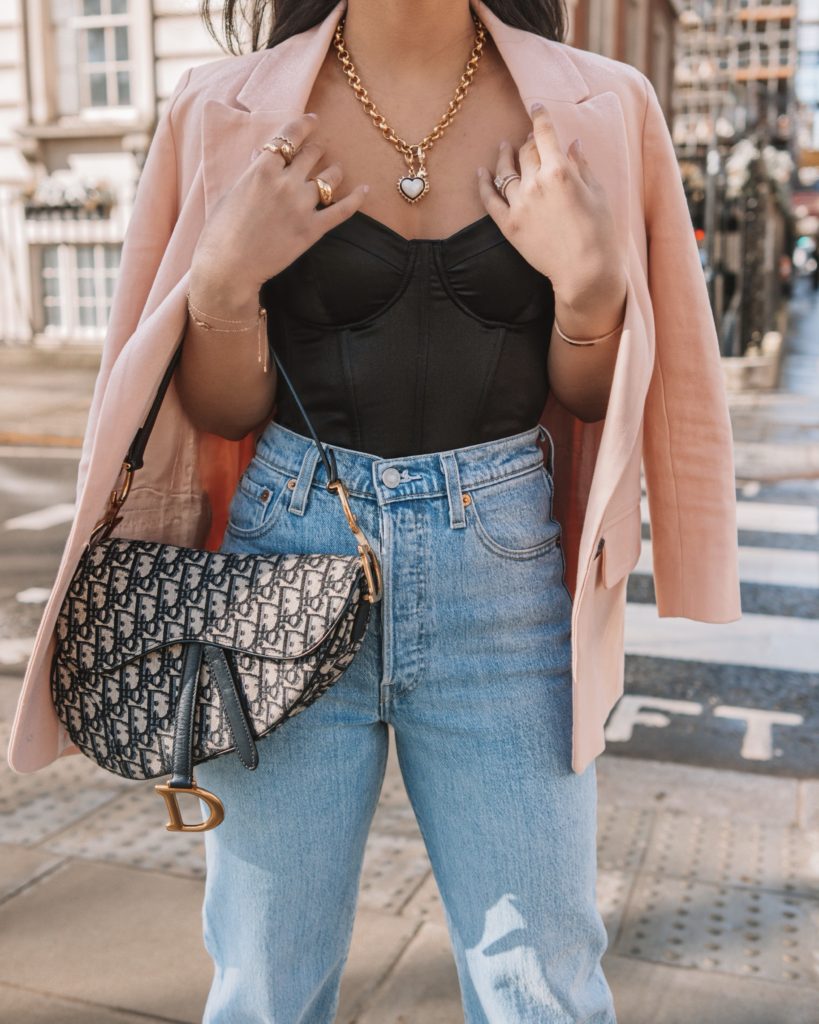 Luxury Fashion Blogger Shloka of The Silk Sneaker styles a Dior Saddle Bag